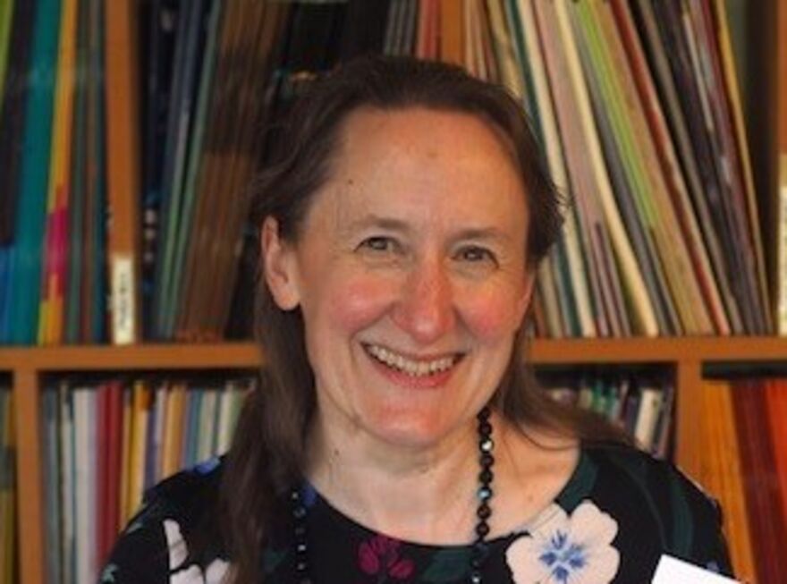 An image of Dr. Ruth Carlyle smiling