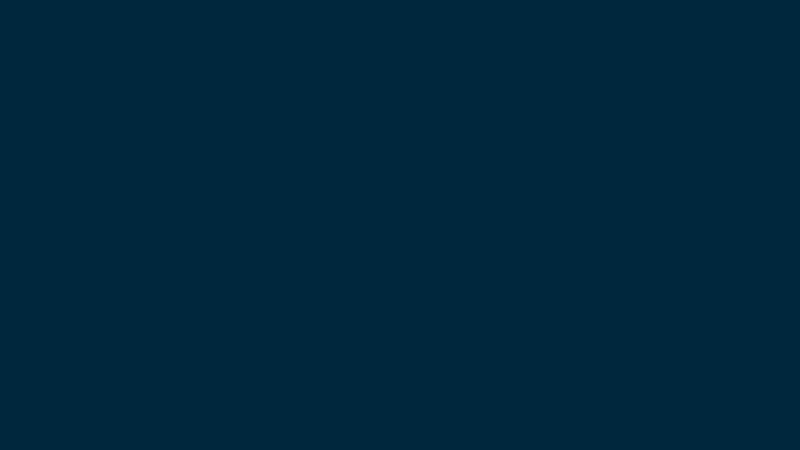 A plain dark blue background