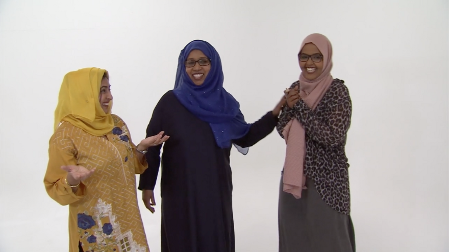 three ladies in conversation